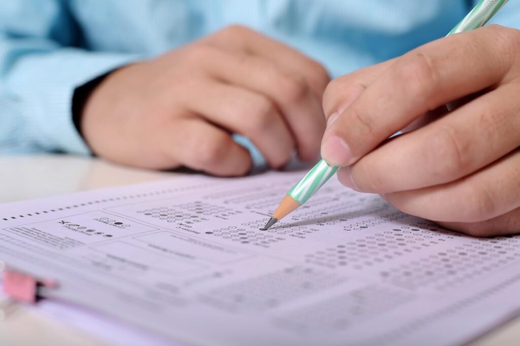 child writing an exam